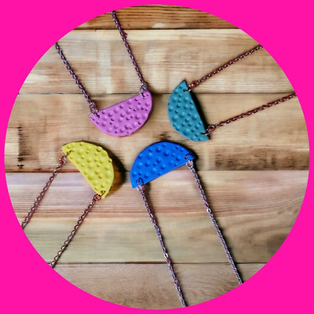4 handmade necklaces in bright colours