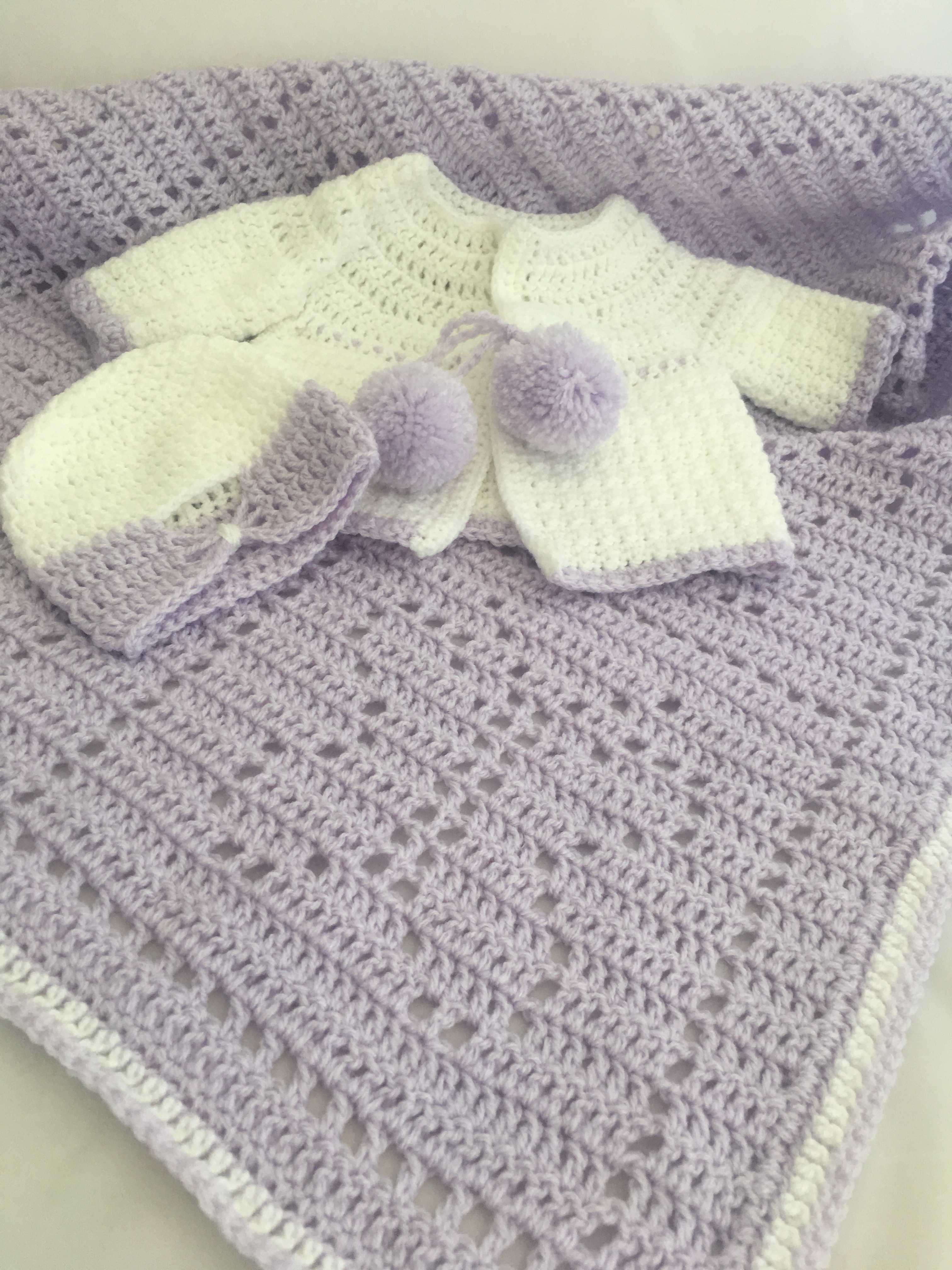 Lilac and White Baby Banket with a matching cardigan and hat